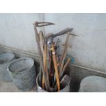 A collection of vintage garden tools