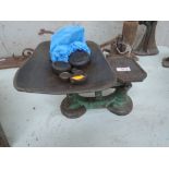 A set of vintage kitchen scales and weights