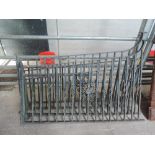 Four lengths of metal railings