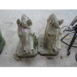 A pair of garden ornament horses head studies