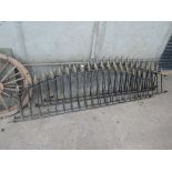 Four lengths of ornate metal wall topping fence