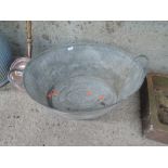 A galvanised tin bath