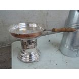 A gas camping stove and frying pan