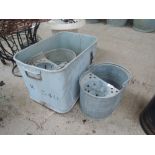 A selection of galvanised wares including mop buckets