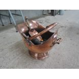 A copper coal helmet and shovel etc