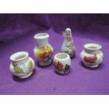 A selection of vintage hand painted caramics