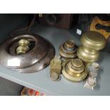 A selection of vintage brass and cast weights in various designs