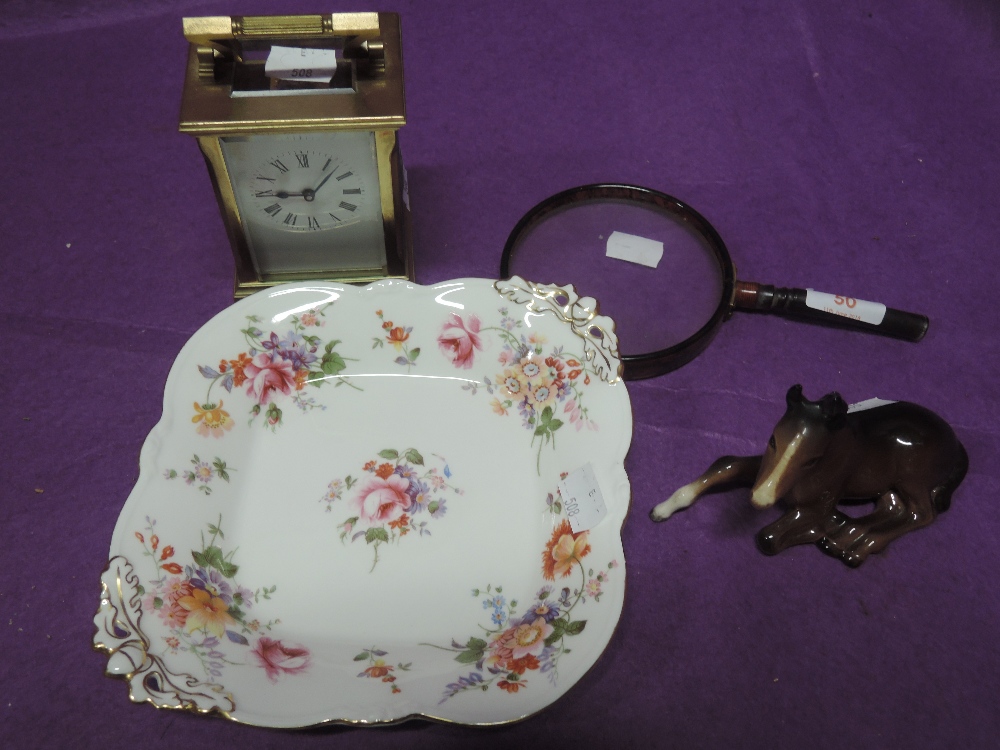 A selection of vintage decorative items including turtle shell style spy glass