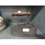 A vintage cast stove iron