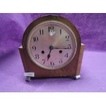 A vintage oak bodied mantle clock with chime