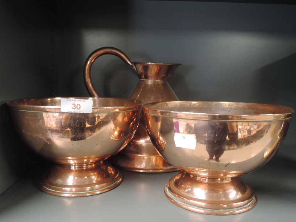 A selection of vintage copper items including pair of footed bowls