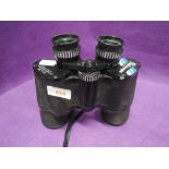 A pair of vintage binoculars Pathescope 10x50