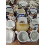 A selection of vintage ceramic jugs some in a Toby style