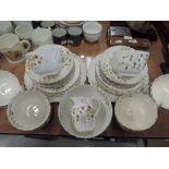 A selection of vintage tea cups and saucers un marked hand decorated