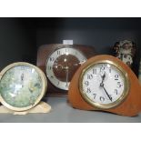 A selection of vintage mantle and bedside clocks including Smith alarm clock