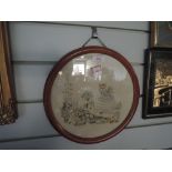 A vintage circular form needle work with flower garden and maiden imagery