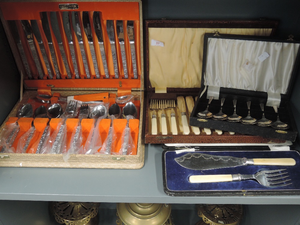 A selection of vintage cutlery and flatware all boxed including Webster and Hill canteen