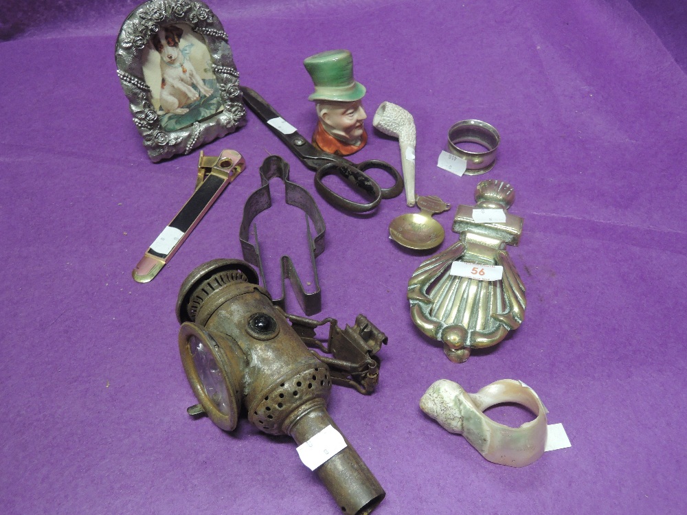 A selection of vintage trinkets and curios including cycle lamp, Beswick head etc