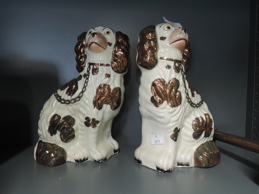 A pair of vintage Staffordshire flat back style dogs