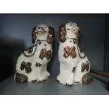 A pair of vintage Staffordshire flat back style dogs