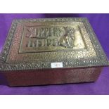 A vintage brass worked slipper box with dog decor