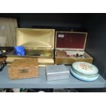 A selection of vintage tins and chests