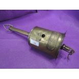 A vintage brass cast slow roaster by William Hood