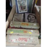 A selection of vintage theatrical and musical items including pianola rolls