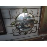 A vintage Kitsch mirror with metal frame work