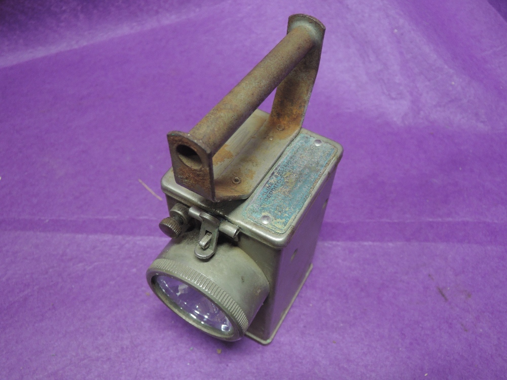 A vintage miners style lamp torch