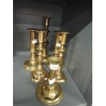 A selection of vintage brass cast candlesticks