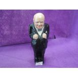 A vintage plaster cast figure of Winston Churchill hand decorated