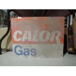 A vintage double sided shop display advert for calor gas