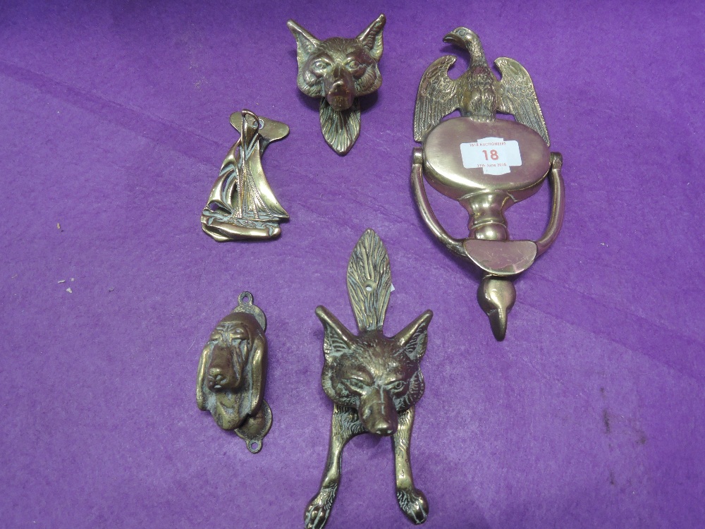 A selection of vintage brass cast door knockers