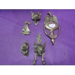 A selection of vintage brass cast door knockers