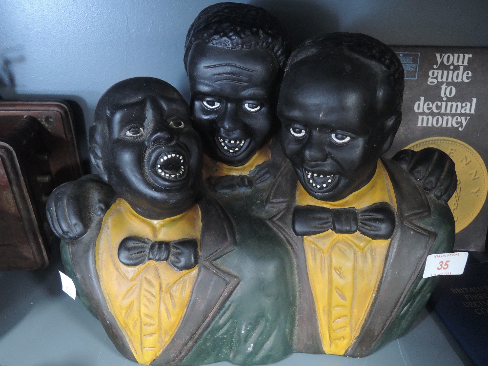 A vintage ceramic figure bust of three American jazz or blues singers 1930's style