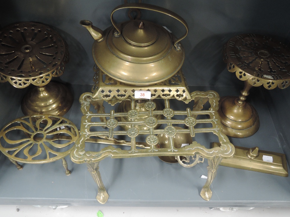 A selection of vintage brass wares including squat travellers kettle