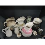 A selection of vintage ceramic jugs including large transfer printed
