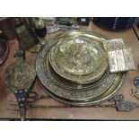 A selection of vintage brass wares including bellows and poker