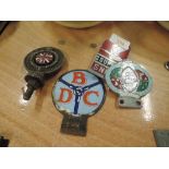 A selection of vintage car and motor badges including Bedford drivers club Westmorland Motor club