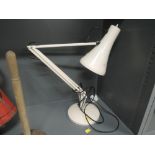 A genuine angle poise lamp in cream