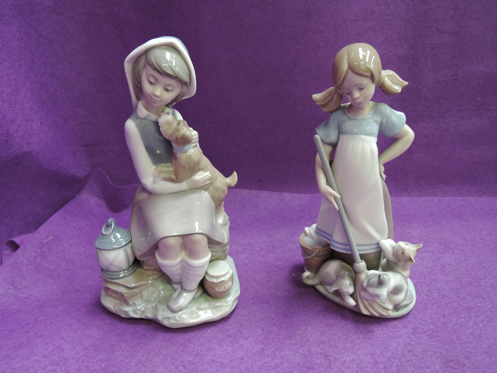 Two Lladro figure groups, Girl with Lantern 4910, & Playful Kittens 5232