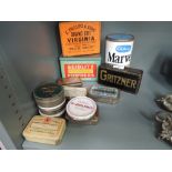 A selection of vintage advertising tins including Gritzner Seidlitz Powders etc