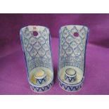 Two vintage ceramic candle holders with bohemian style print