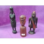 A selection of vintage hand carved African figures