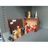 A selection of various chess pieces and counters bone and turned wood styles