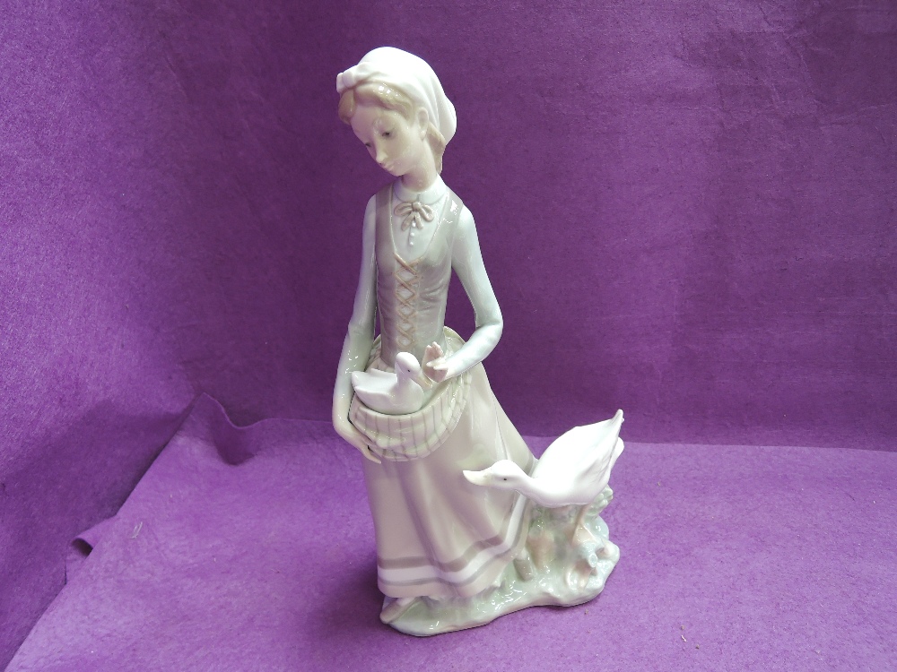 A Lladro figure group, Girl with Goose 4815