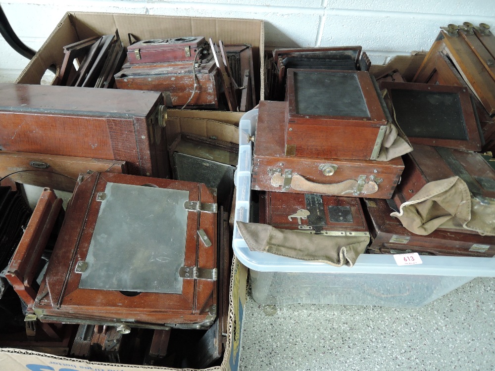 Four boxes of mahogany and brass field camera parts including Thornton Pickard Ruby