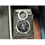 A Lubitel 166B reflex camera in soft case