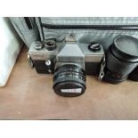 A Praktica MTL5 camera and two Carl Zeiss Jena lenses in soft carry bag